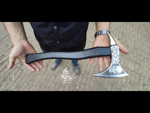 Gloomspire-inspired Viking outdoor axe video displaying crescent steel blade patterns and compact tactical craftsmanship.