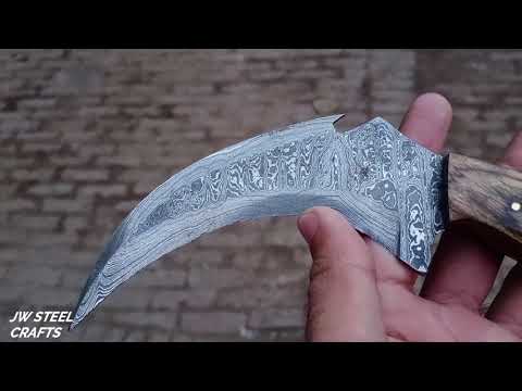 Damascus karambit knife..